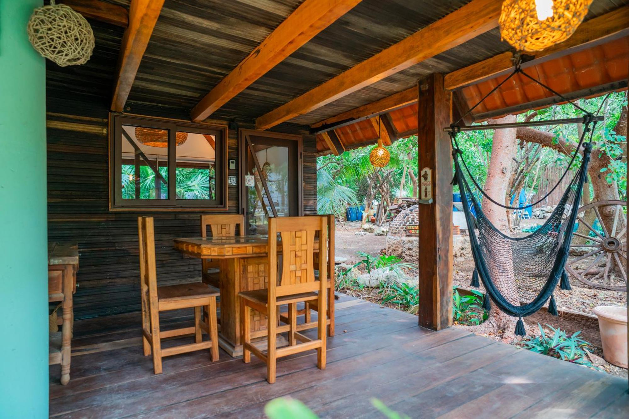 Cabana Chechen, Wooden Chalet In Tropical Garden Isla Mujeres Bagian luar foto