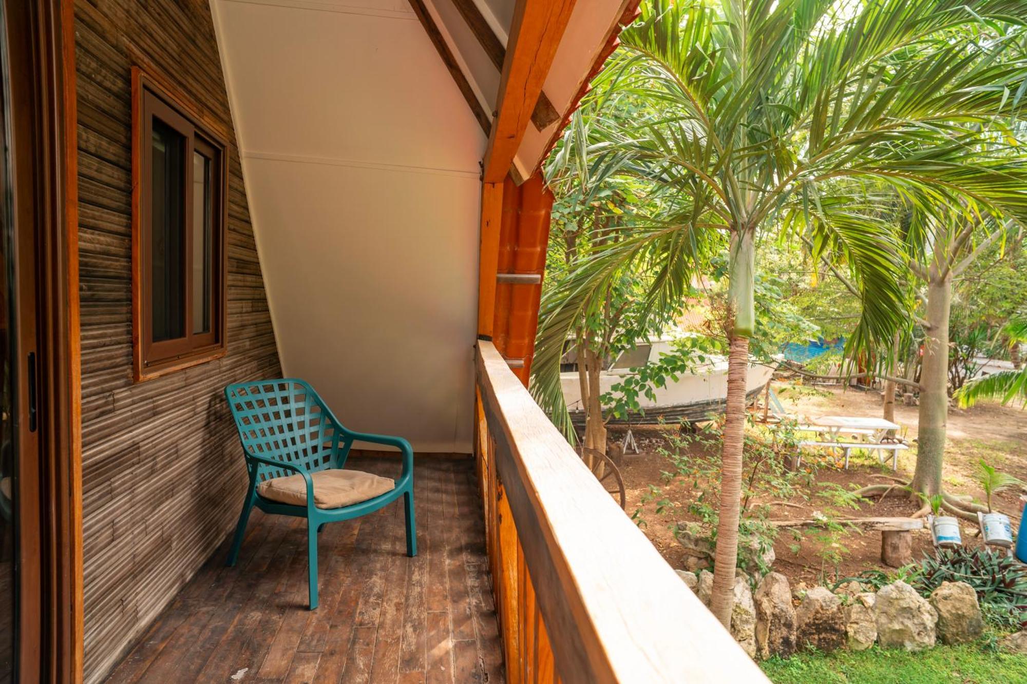 Cabana Chechen, Wooden Chalet In Tropical Garden Isla Mujeres Bagian luar foto