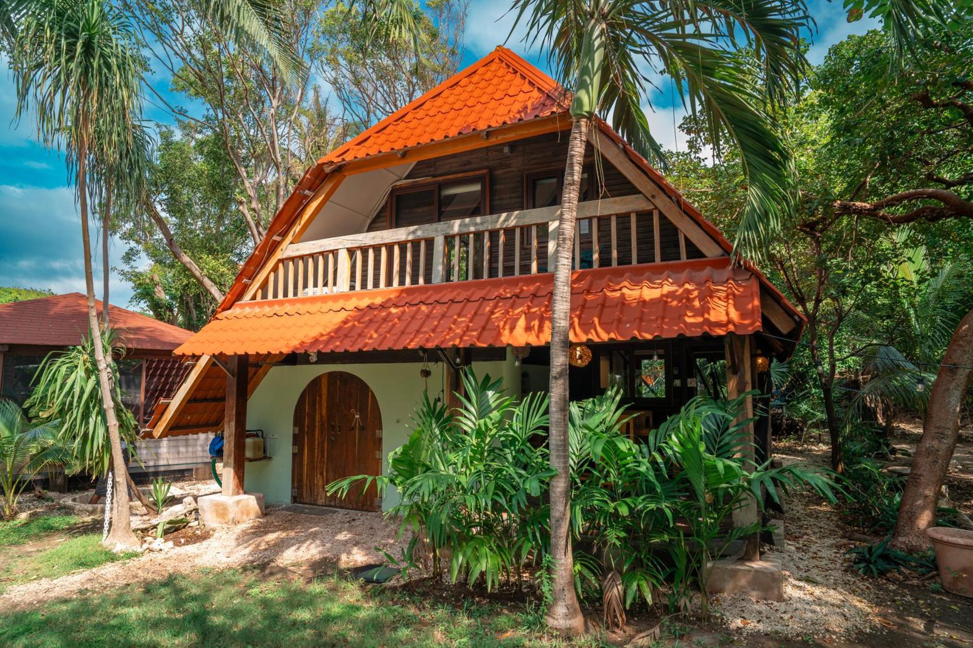 Cabana Chechen, Wooden Chalet In Tropical Garden Isla Mujeres Bagian luar foto